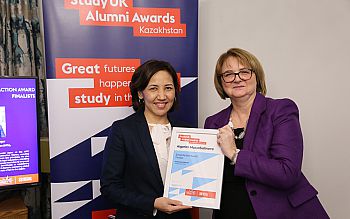 Alumna Dr Aigerim Mussabalinova being presented with her finalist's certificate by the UK Ambassador to Kazakhstan