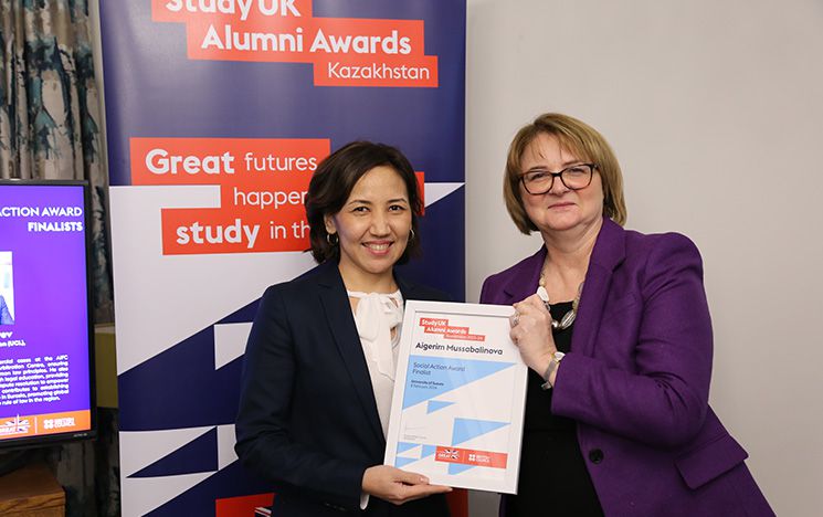 Alumna Dr Aigerim Mussabalinova being presented with her finalist's certificate by the UK Ambassador to Kazakhstan