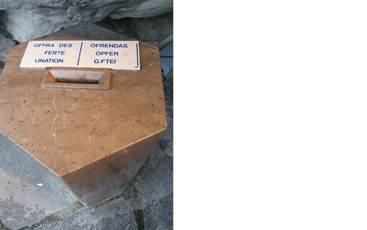collection box in the Lourdes Grotto