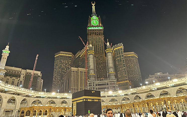 The Kabba eclipsed by the skyscrapers.