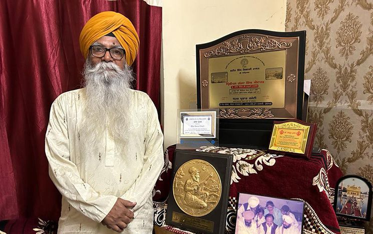Professor Rawail Singh (Amritsar Wale) with his music awards