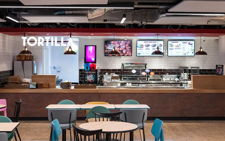 A view of the counter serving Tortilla-branded food inside Eat Central