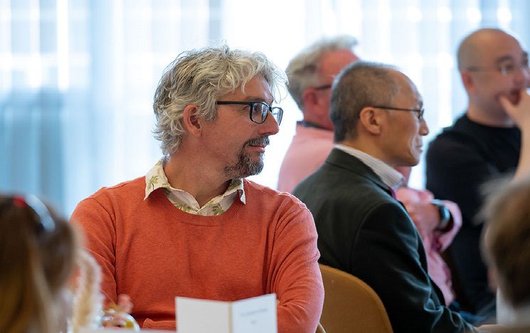 Professor Mike Collyer at event indoors