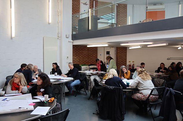 The Brighton and Hove Food Strategy Event. Attendees having discussions around tables